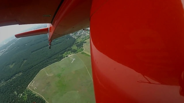 Video Reference: Red, Flap, Airplane, Vehicle, Air travel, Wing, General aviation, Aviation, Aircraft, Flight