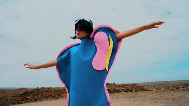 Video Reference: blue, sky, vacation, fun, shoulder, beach, girl, wetsuit, summer, personal protective equipment, Person