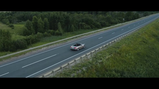 Video Reference: Road, Vehicle, Race track, Lane, Performance car, Asphalt, Car, Mode of transport, Road surface, Highway