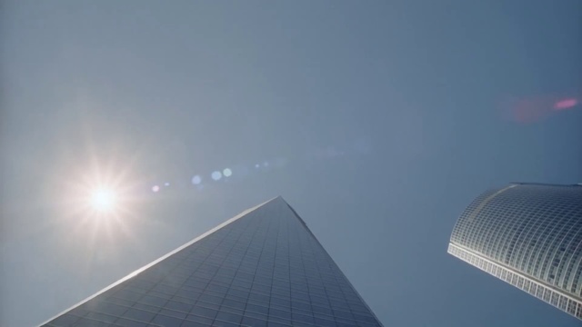 Video Reference: Sky, Daytime, Architecture, Blue, Atmospheric phenomenon, Landmark, Light, Skyscraper, Cloud, Line