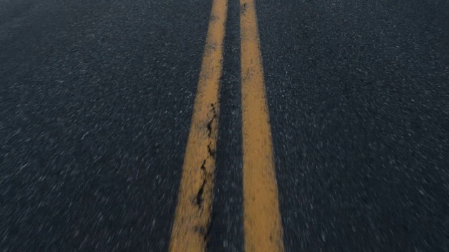 Video Reference: Asphalt, Black, Road surface, Line, Road, Brown, Lane, Wood, Infrastructure, Font