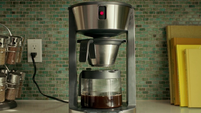 Video Reference: Small appliance, Coffeemaker, Home appliance, Drip coffee maker, Kitchen appliance, Coffee filter, Coffee grinder, Juicer, Person