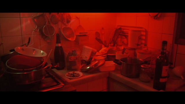 Video Reference: red, light, darkness, still life photography, stemware, darkroom, art, midnight, computer wallpaper, font, Person