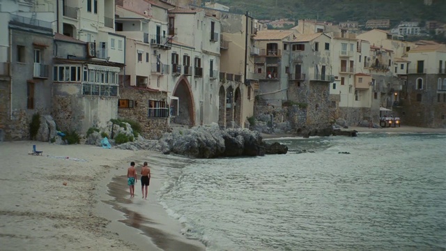 Video Reference: Water, Building, Window, Body of water, Coastal and oceanic landforms, Morning, Beach, City, Facade, House