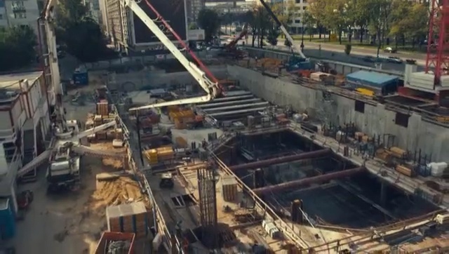 Video Reference: Construction, Crane, Metropolitan area, Aerial photography, Urban area, Thoroughfare, Residential area, City, Condominium, Reinforced concrete