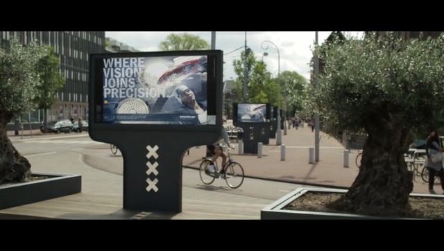 Video Reference: Tree, Mode of transport, Snapshot, Photography, Technology, Advertising, Electronic device, Bicycle, Architecture, Art, Person