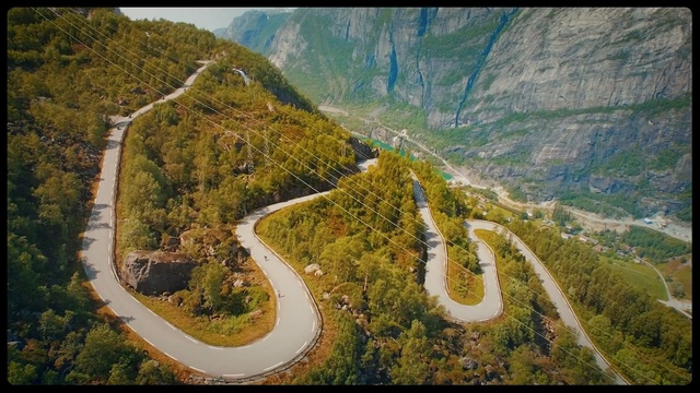 Video Reference: Natural landscape, Mountainous landforms, Mountain pass, Aerial photography, Mountain, Road, Highland, Bird-eye view, Thoroughfare, Landscape