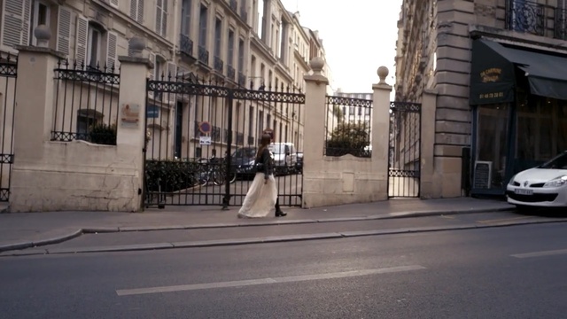 Video Reference: car, land vehicle, road, lane, town, street, neighbourhood, infrastructure, urban area, vehicle