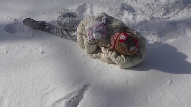 Video Reference: Snow, Winter, Outdoor, Child, Young, Man, Laying, Sitting, Riding, Covered, Boy, Slope, Little, Lying, Mountain, Hill, Skiing, Standing, People, Group, Board, Bed, Stuffed, Clothes