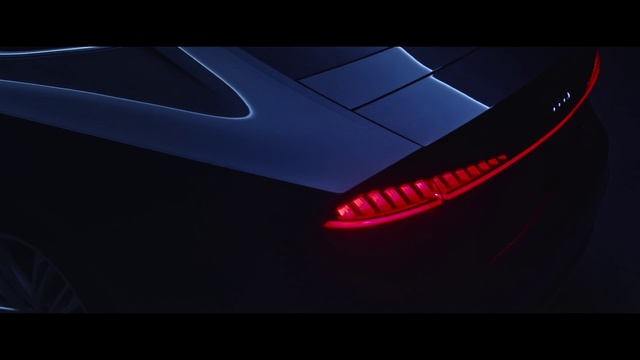Video Reference: Automotive design, Vehicle, Car, Automotive lighting, Concept car, Vehicle door, Automotive exterior, Compact car, Sports car, Computer, Sitting, Dark, Laptop, Red, Table, Light, Keyboard, Lit, Desk, Mouse, Night, Large, Remote, White, Text, Land vehicle