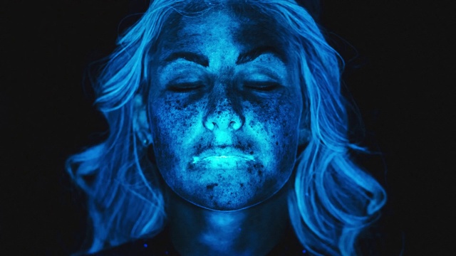 Video Reference: Face, Blue, Head, Chin, Human, Mouth, Electric blue, Portrait, Organism, Photography