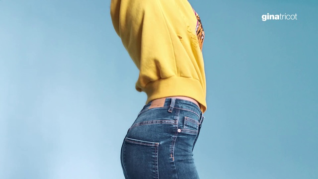 Video Reference: Jeans, Clothing, Yellow, Denim, Waist, Standing, Joint, Outerwear, Sleeve, Abdomen