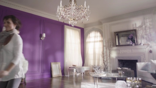 Video Reference: room, purple, interior design, living room, ceiling, furniture, home, dining room, decor, table, Person