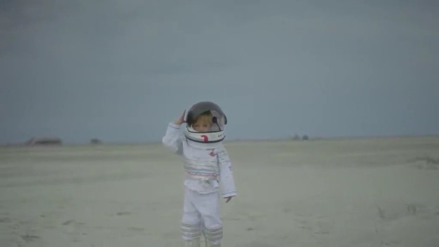 Video Reference: White, Natural environment, Sand, Fun, Standing, Child, Landscape, Sky, Vacation, Sea