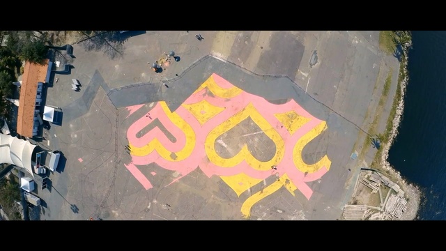 Video Reference: art, wall, street art, area, sky, screenshot, space, world, graffiti, mural, Person