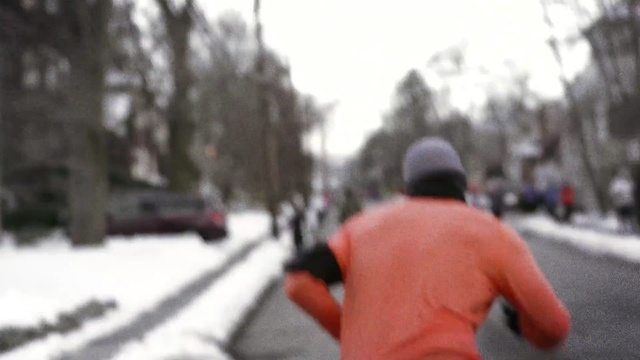 Video Reference: car, snow, mode of transport, winter, road, vehicle, tree, lane, recreation, street, Person