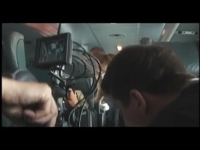 Video Reference: face, technology, mode of transport, mouth, glass, organ, audio equipment, audio, film, windshield