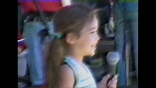 Video Reference: hair, face, people, facial expression, human hair color, child, girl, mammal, nose, hairstyle