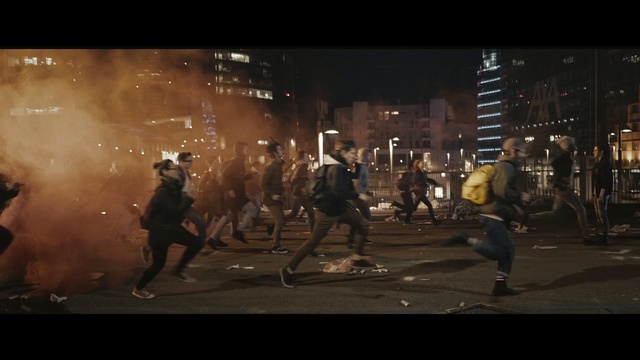 Video Reference: Public event, Crowd, Movie, Event, Protest, Night, Screenshot, Action film, Performance, Midnight, Person
