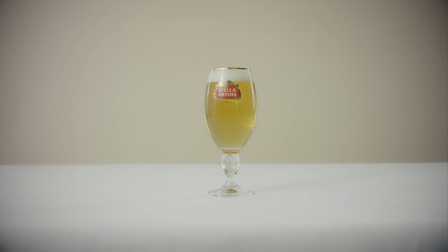 Video Reference: yellow, drink, beer glass, glass, champagne stemware, juice, bellini, cocktail, still life photography, Person