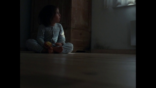 Video Reference: Child, Sitting, Floor, Darkness, Human, Flooring, Room, Window, Adaptation, Photography