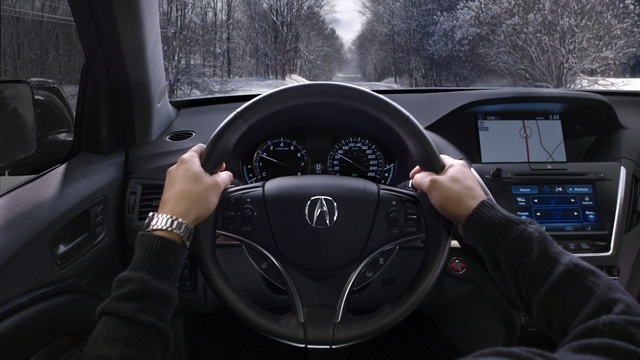 Video Reference: Steering part, Steering wheel, Vehicle, Car, Motor vehicle, Auto part, Driving, Luxury vehicle, Automotive design, Speedometer, Person