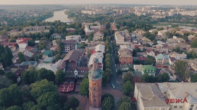 Video Reference: Aerial photography, Birds-eye view, Urban area, Residential area, Suburb, Metropolitan area, Town, Human settlement, City, Photography