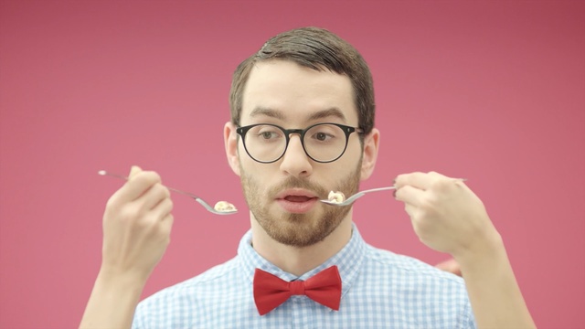 Video Reference: Face, Glasses, Nose, Eyewear, Tie, Bow tie, Head, Forehead, Chin, Gesture, Person