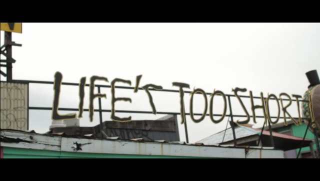 Video Reference: Iron, Metal, Text, Architecture, Table, Handrail, Font, Furniture, Art, Roof, Person