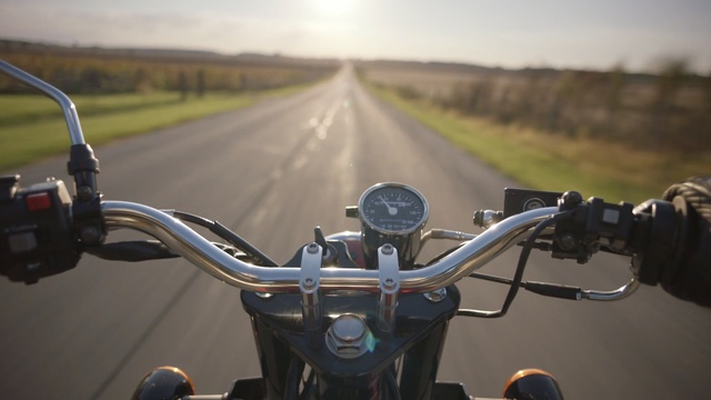 Video Reference: land vehicle, car, motor vehicle, vehicle, motorcycle, mode of transport, motorcycling, road, road trip, bicycle accessory