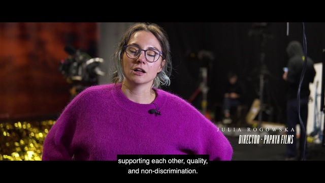 Video Reference: Purple, Eyewear, Photo caption, Human, Fun, Glasses, Photography, Adaptation, Portrait, Smile