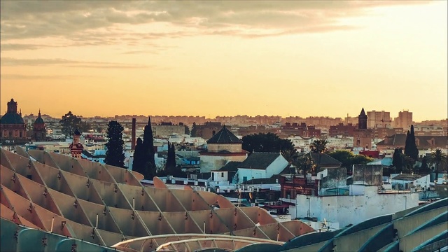 Video Reference: Sky, Cloud, Urban area, Roof, City, Town, Daytime, Human settlement, Cityscape, Horizon