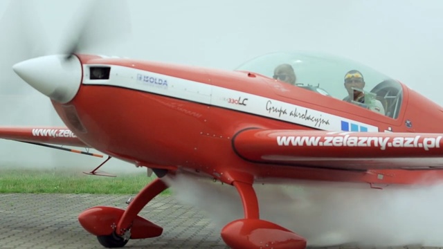 Video Reference: Airplane, Aircraft, Monoplane, Vehicle, Aviation, Propeller-driven aircraft, Propeller, Extra ea-300, General aviation, Air racing, Person