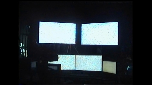 Video Reference: Shade, Rectangle, Tints and shades, Display device, Glass, Event, Multimedia, Projector accessory, Ceiling, Room