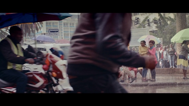 Video Reference: people, crowd, man, infrastructure, road, street, snapshot, urban area, male, photography, Person