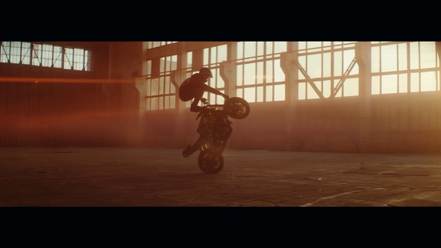 Video Reference: Stunt performer, Stunt, Wheelie, Screenshot, Extreme sport, Vehicle, Freestyle motocross, Photography, Motorcycle, Soil