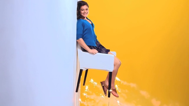 Video Reference: blue, yellow, sitting, standing, shoulder, arm, joint, fun, shoe, Person