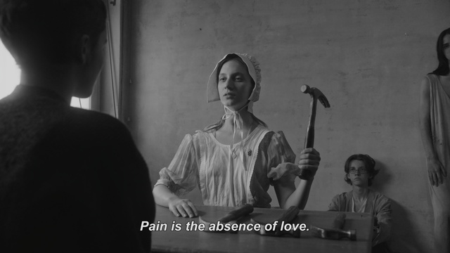 Video Reference: Music, Black-and-white, Monochrome, Monochrome photography, Photography, String instrument, Performance, Adaptation, Musical instrument, Plucked string instruments, Person, Man, Holding, Woman, Standing, Looking, Photo, Front, Sitting, Young, Umbrella, Player, Mirror, Room, White, People, Shirt, Playing, Wall, Human face, Clothing, Text