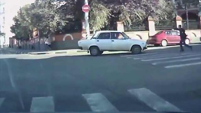 Video Reference: Land vehicle, Vehicle, Car, Asphalt, Mode of transport, Family car, Classic car, Road, Infrastructure, Parking