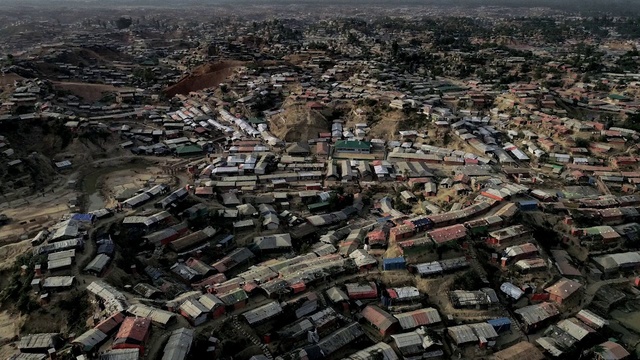Video Reference: Aerial photography, Urban area, Residential area, Birds-eye view, Human settlement, Suburb, City, Metropolitan area, Landscape, Photography