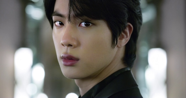 Video Reference: Hair, Face, Facial expression, Black hair, Eyebrow, Hairstyle, Forehead, Chin, Beauty, Nose