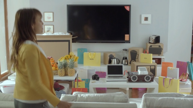 Video Reference: furniture, room, interior design, home, living room, desk, table, Person