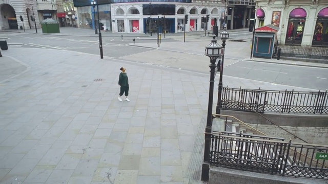 Video Reference: Sidewalk, Pedestrian, Street, Road surface, Handrail, Walkway, Road