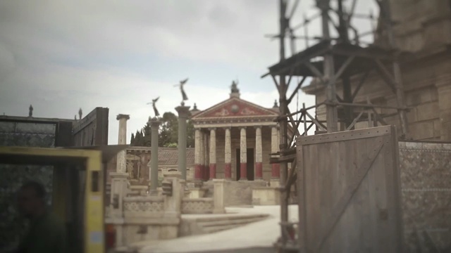 Video Reference: Landmark, Building, Architecture, Town, Neighbourhood, Facade, House, Historic site, Temple, Château, Person