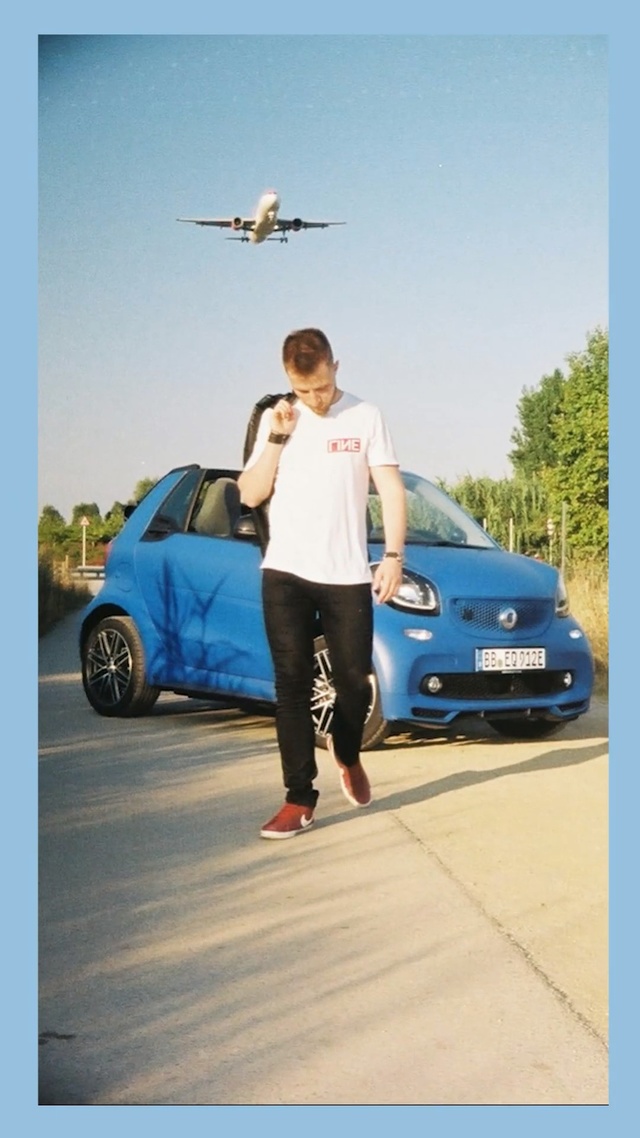 Video Reference: Land vehicle, Vehicle, Car, Vehicle door, City car, Hatchback, Subcompact car, Advertising, Compact car, Person