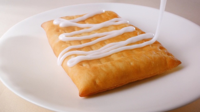 Video Reference: Dish, Food, Cuisine, Ingredient, Baked goods, Pastry, Toaster strudel, Dessert, Produce, Fried food, close up