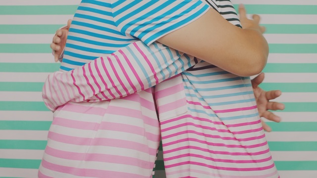 Video Reference: Pink, Clothing, Turquoise, Joint, Pattern, Shoulder, Waist, Shorts, Textile, Pattern