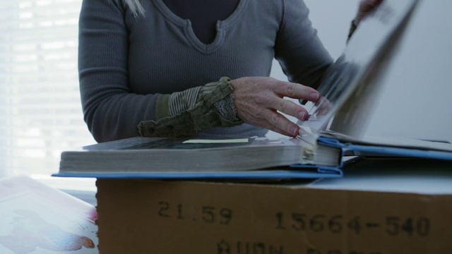 Video Reference: Hand, Document, Table, Furniture, Writing