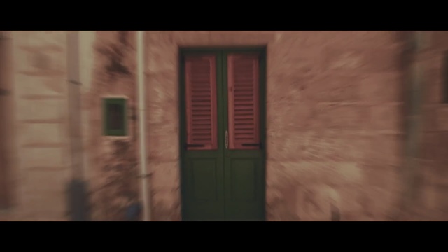 Video Reference: black, wall, darkness, text, wood, snapshot, home, screenshot, door, wood stain, Person