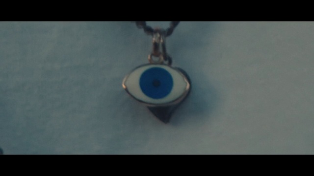 Video Reference: Pendant, Locket, Jewellery, Necklace, Fashion accessory, Cobalt blue, Azure, Still life photography, Person